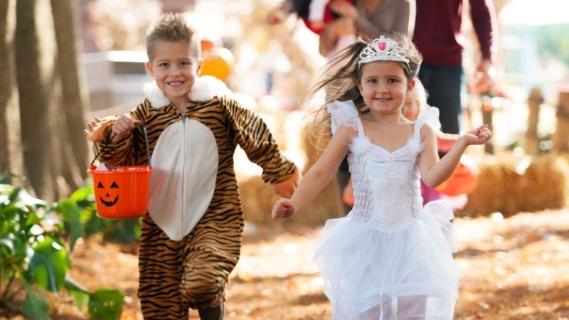 Kids running through forest