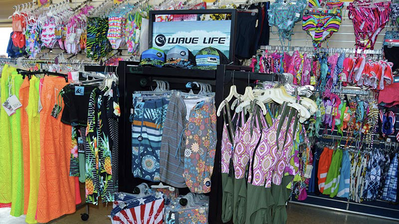 Swimsuits and hats at store