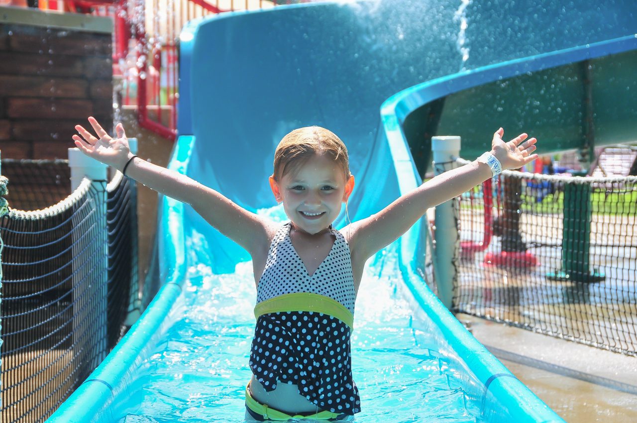 Family in front of wave pool